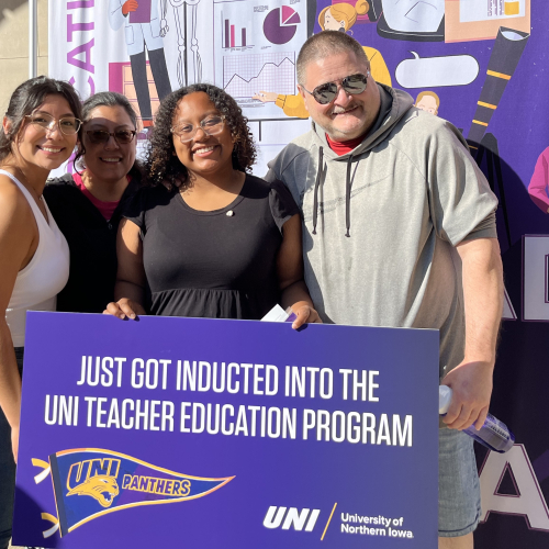 Student and family at convocation 